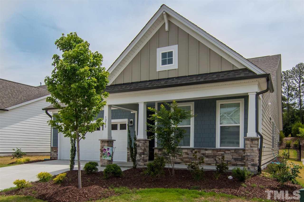 1210 Pondfield Way Durham, NC 27713 - Photo 2 of 29 a front view of a house with garden