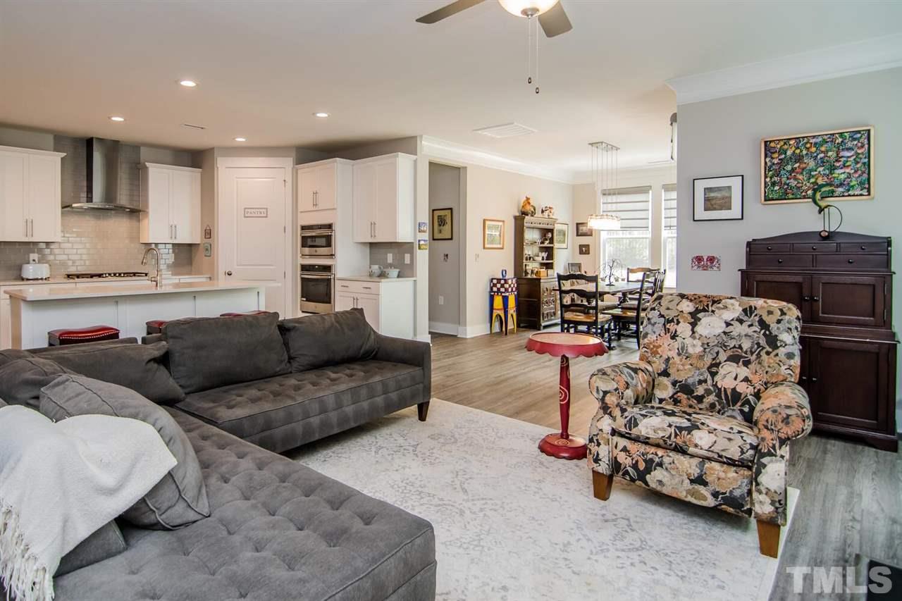1210 Pondfield Way Durham, NC 27713 - Photo 13 of 29 a living room with furniture and kitchen view