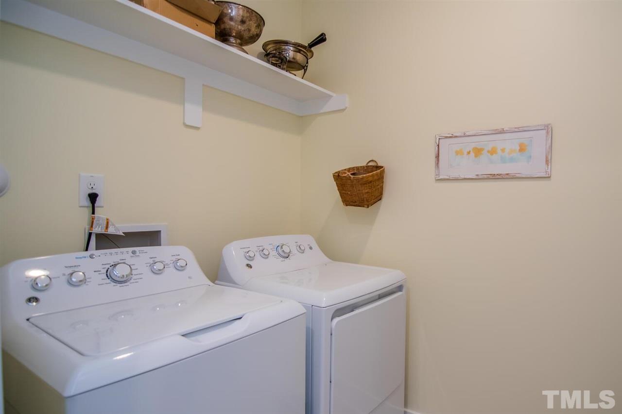 1210 Pondfield Way Durham, NC 27713 - Photo 25 of 29 a utility room with dryer and washer