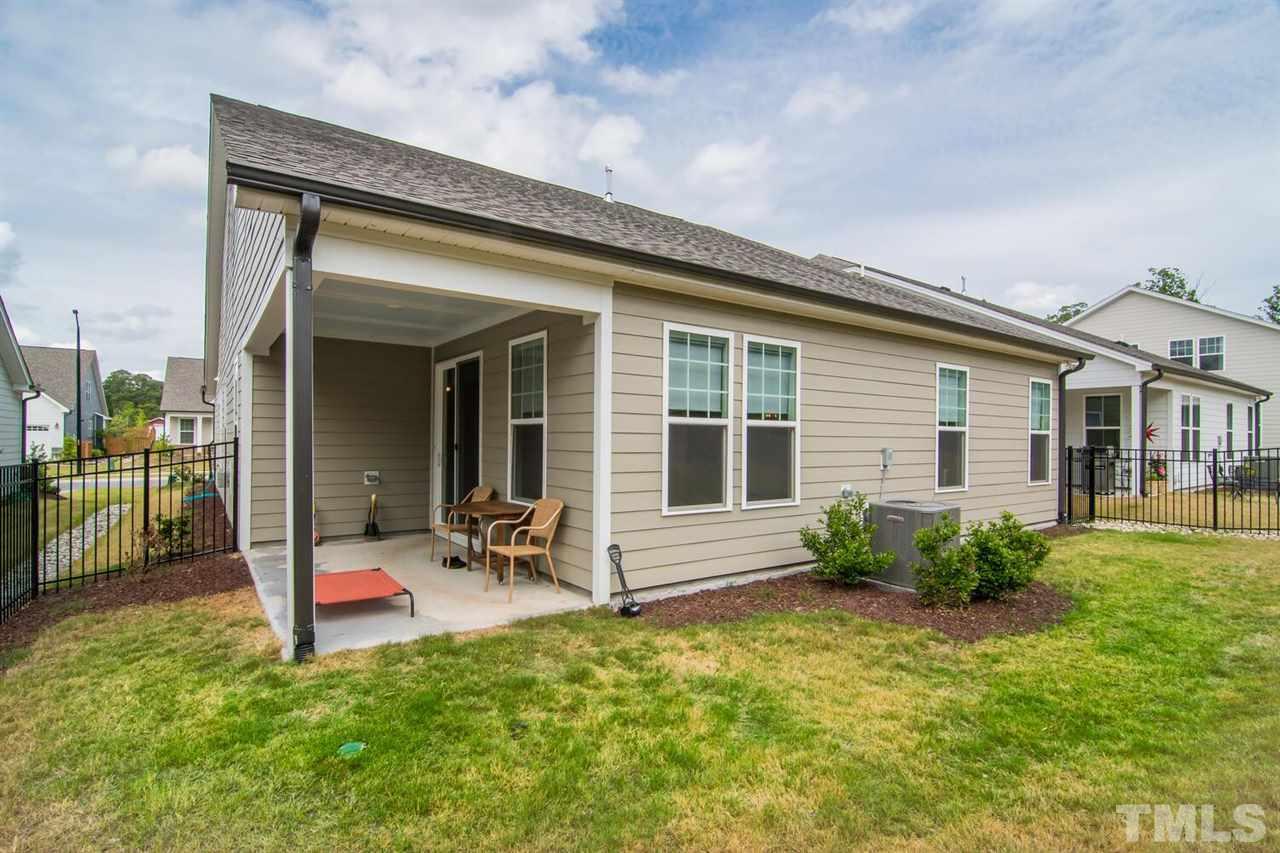 1210 Pondfield Way Durham, NC 27713 - Photo 27 of 29 a house view with a garden space