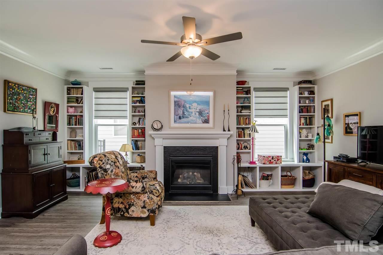 1210 Pondfield Way Durham, NC 27713 - Photo 10 of 29 a living room with furniture and a fireplace