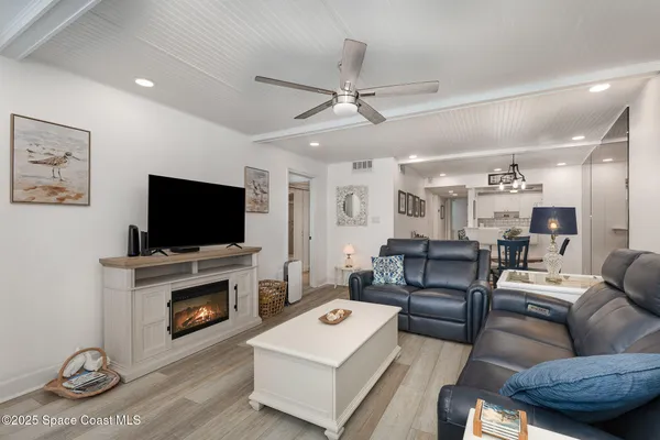 a view of a balcony with furniture