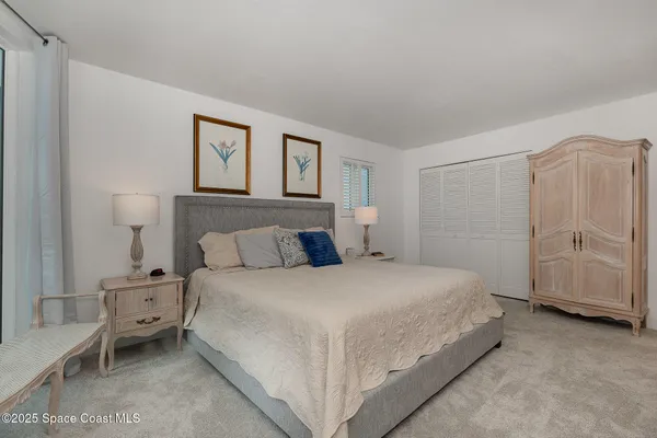 a bathroom with a shower a toilet and a sink