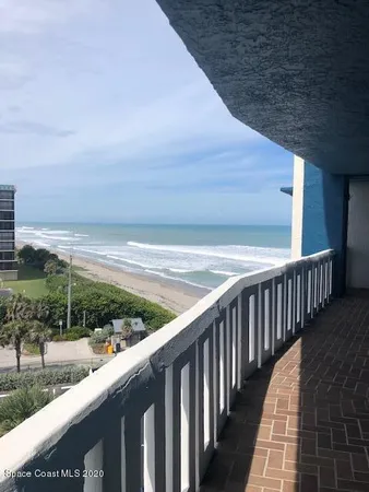 a view of a bathroom from a hallway