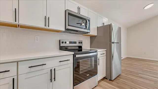 a bathroom with a sink a toilet and a bathtub