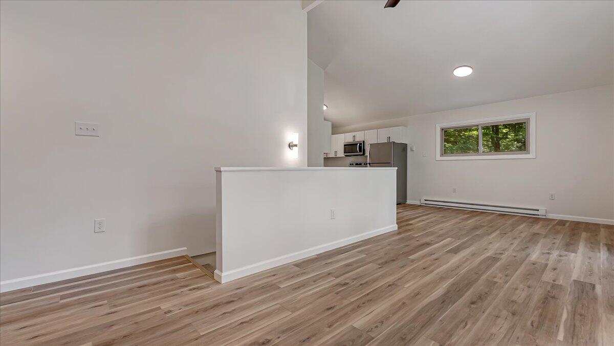 169 Sportsmen Drive Cresco, PA 18326 - Photo 16 of 61 a view of a kitchen with wooden floor and a sink