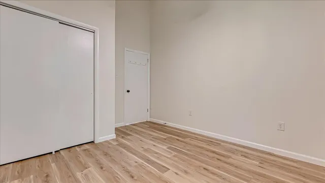 wooden floor and windows in an empty room
