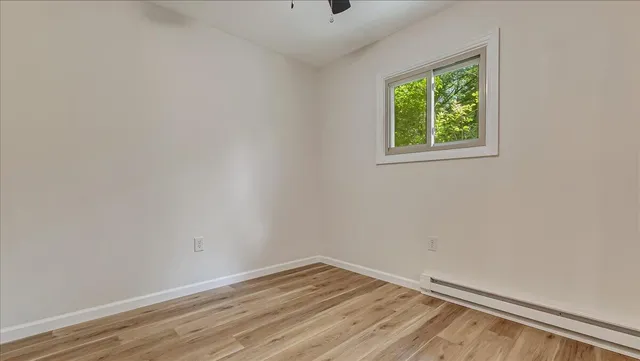 a view of a wooden fence