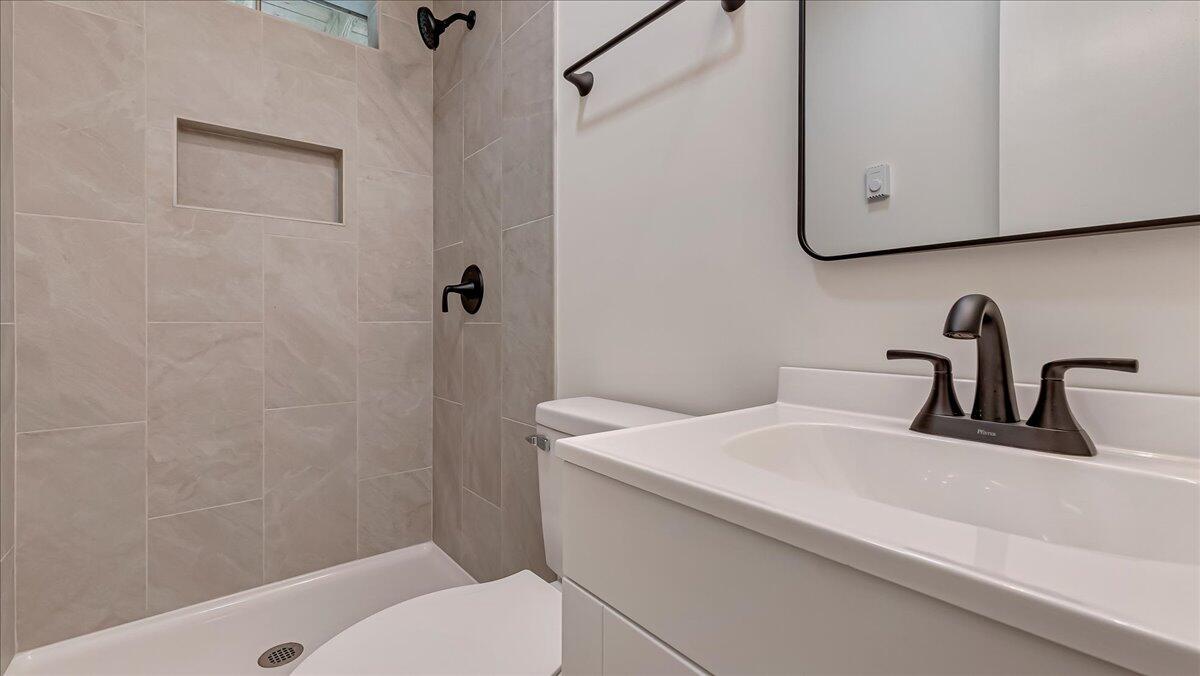 169 Sportsmen Drive Cresco, PA 18326 - Photo 30 of 61 a bathroom with a sink a toilet and shower