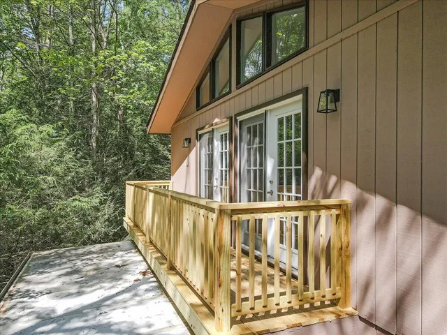 a house with trees in front of it
