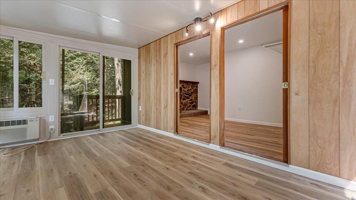 169 Sportsmen Drive Cresco, PA 18326 - Photo 32 of 61 wooden floor and windows in an empty room