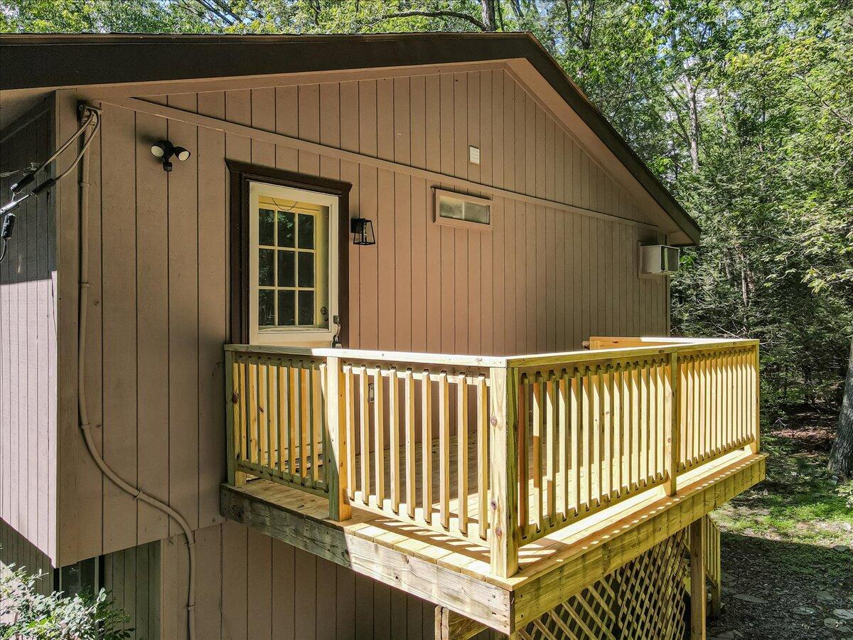 169 Sportsmen Drive Cresco, PA 18326 - Photo 46 of 61 a view of a balcony with swing
