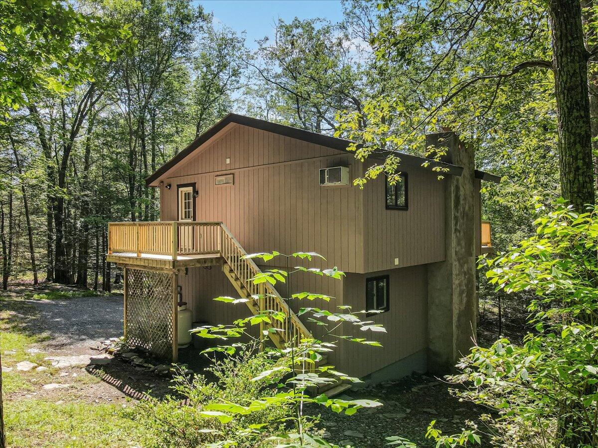 169 Sportsmen Drive Cresco, PA 18326 - Photo 53 of 61 a backyard of a house with lots of green space