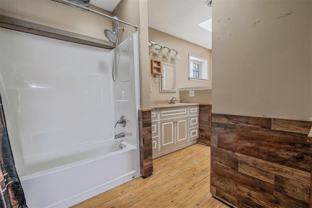 836 Saxonburg Road Butler, PA 16002 - Photo 22 of 49 a bathroom with a bathtub and a sink
