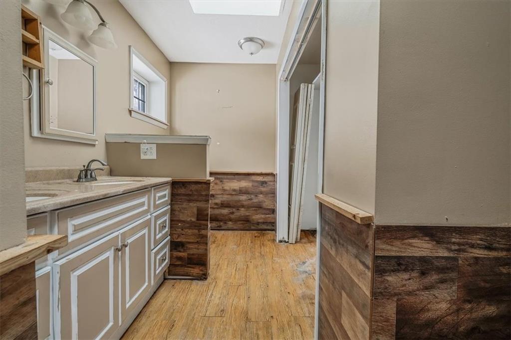 836 Saxonburg Road Butler, PA 16002 - Photo 23 of 49 a kitchen with cabinets and wooden floor