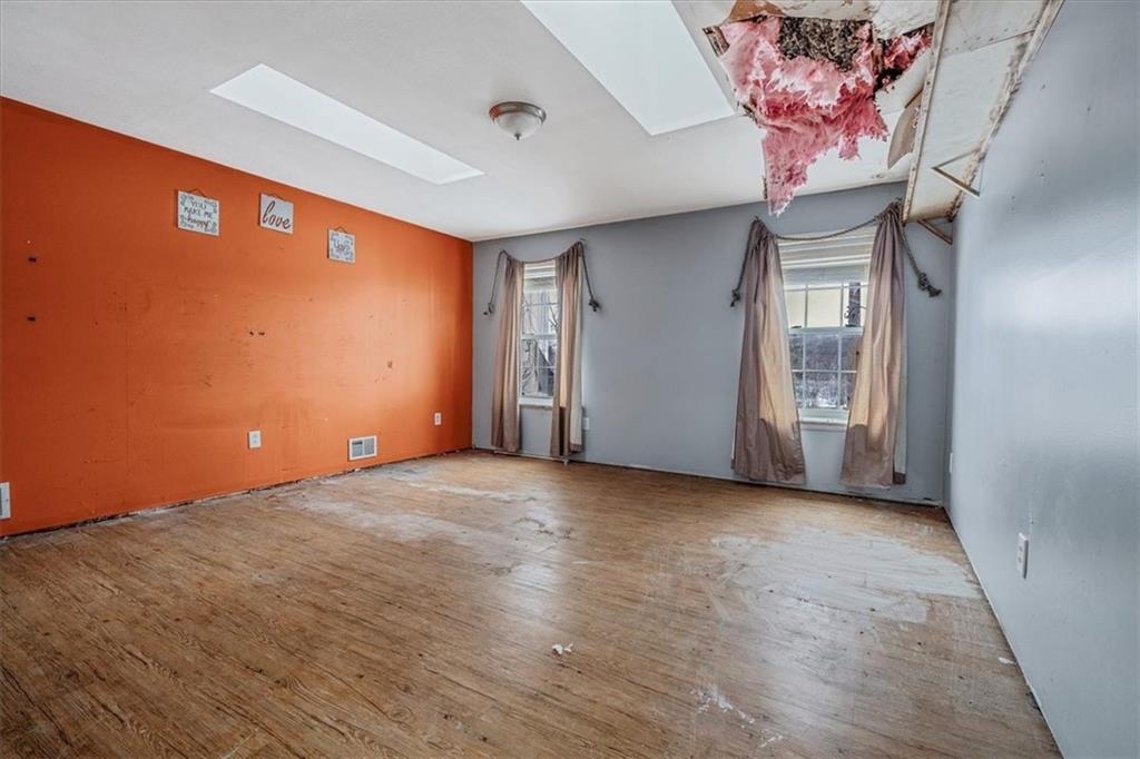 836 Saxonburg Road Butler, PA 16002 - Photo 25 of 49 a view of a livingroom with an empty space and a window