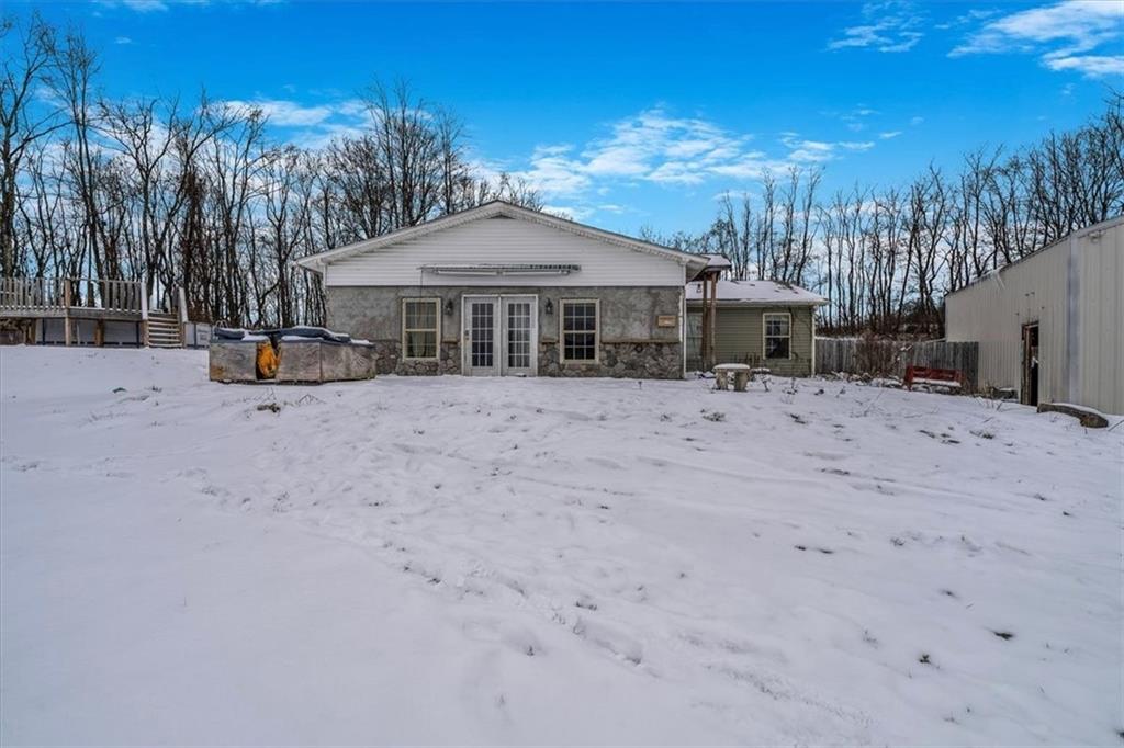 836 Saxonburg Road Butler, PA 16002 - Photo 46 of 49 a view of a house with a snow in the background