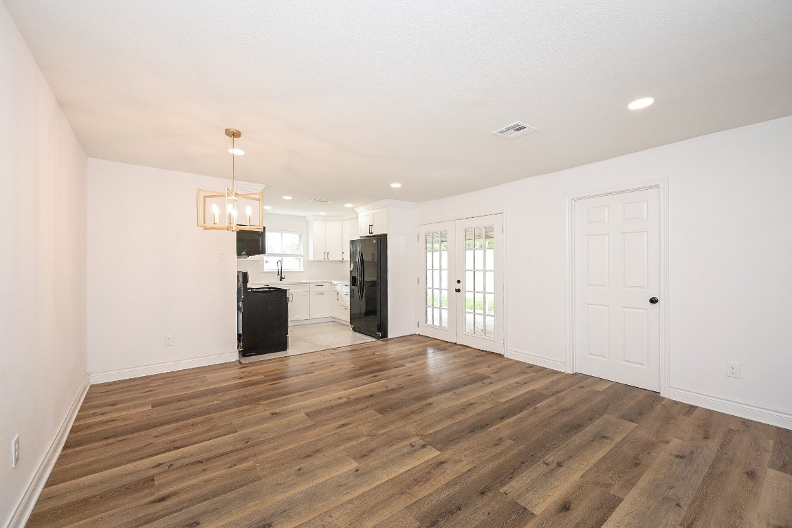11027 Maize Lane Houston, TX 77041 - Photo 6 of 32 a view of kitchen with wooden floor