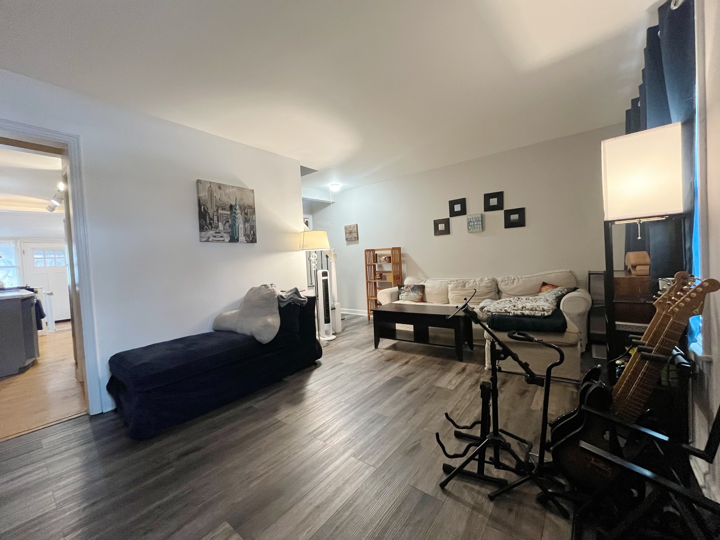 2950 Des Plaines Avenue, Unit 2950 North Riverside, IL 60546 - Photo 4 of 11 a living room with furniture and wooden floor