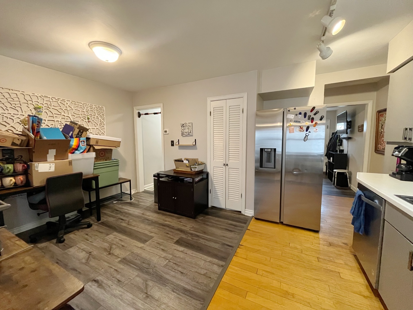 2950 Des Plaines Avenue, Unit 2950 North Riverside, IL 60546 - Photo 7 of 11 a living room with furniture and a flat screen tv