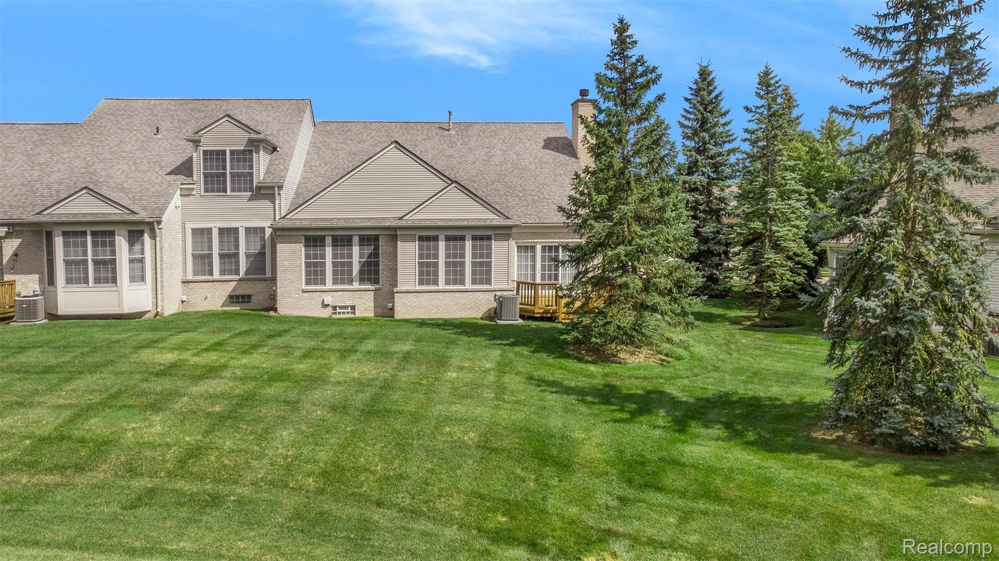 1379 Copper Circle, Unit 35 Rochester, MI 48306 - Photo 9 of 47 LOTS OF PINE TREES FOR YEAR-ROUNDGREENERY!