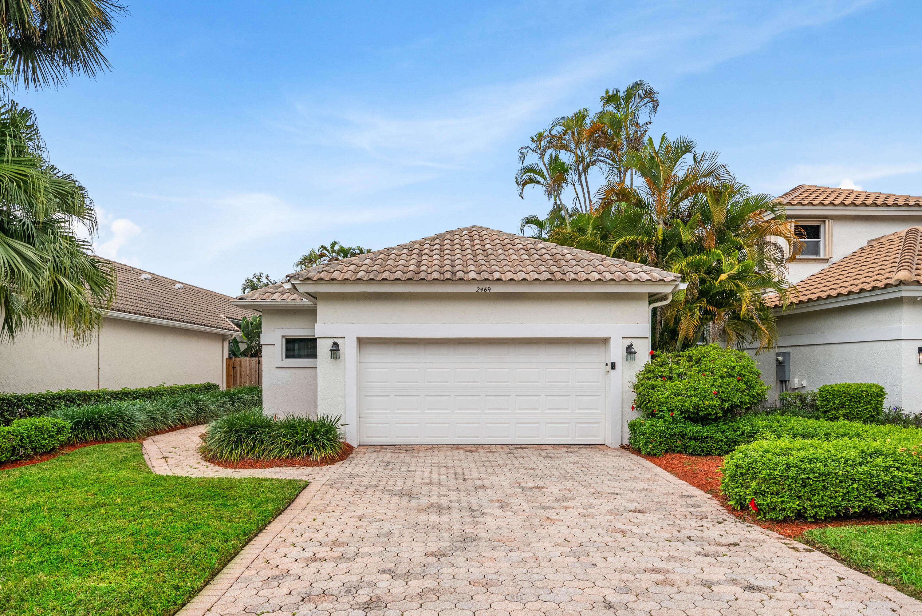2469 Northwest 66th Drive Boca Raton, FL 33496 - Photo 2 of 32 Front