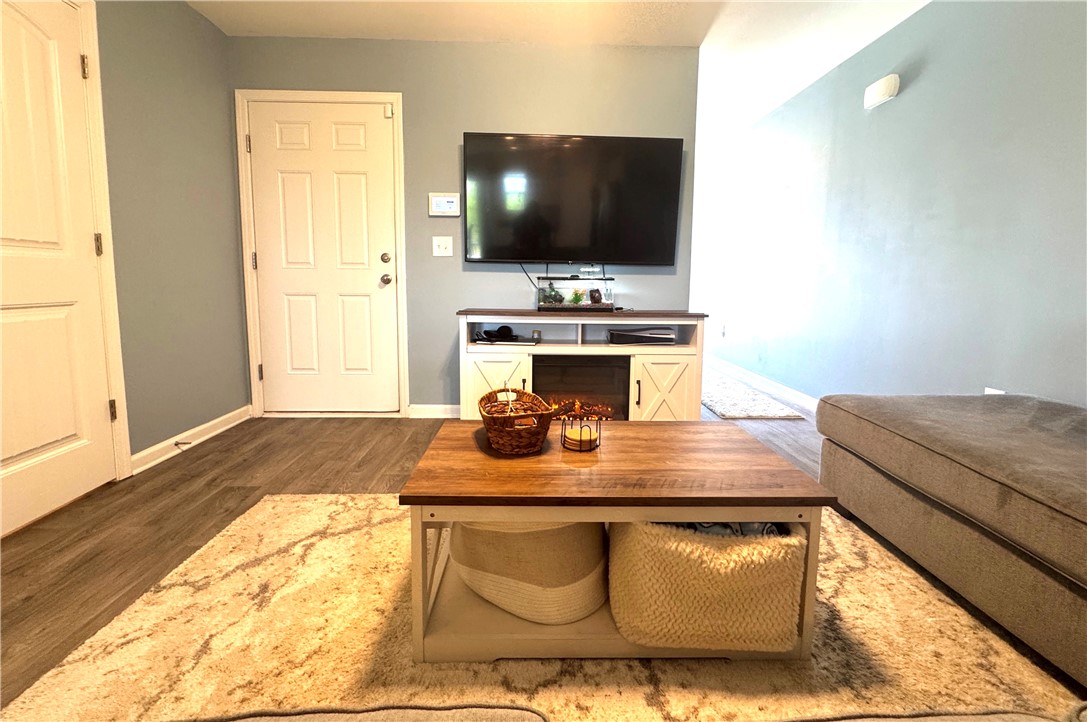 143 Adger Road Pendleton, SC 29670 - Photo 8 of 30 Gleaming wood-look floors anchor this welcoming entryway and living area.