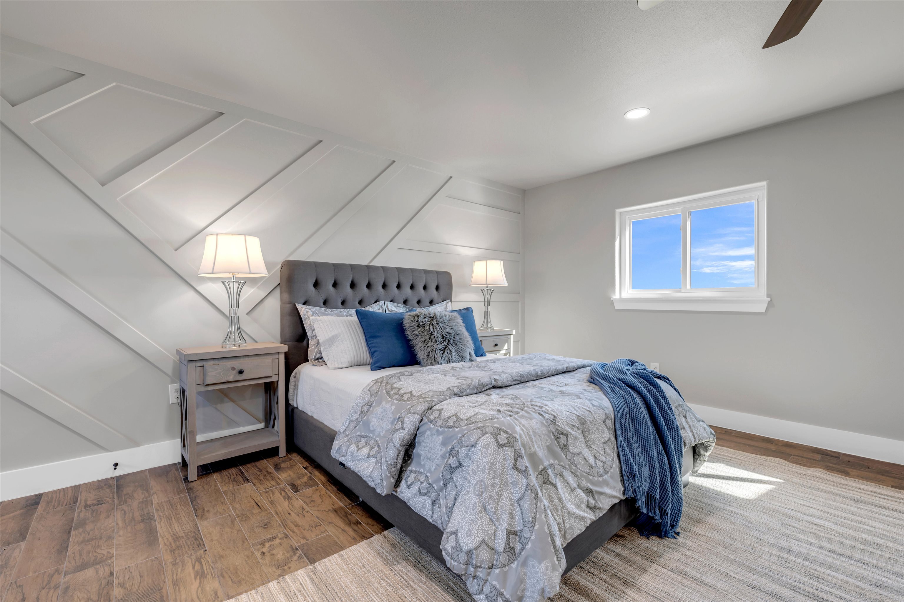 941 County Road 402 Marble Falls, TX 78654 - Photo 11 of 30 a bedroom with a bed and wooden floor