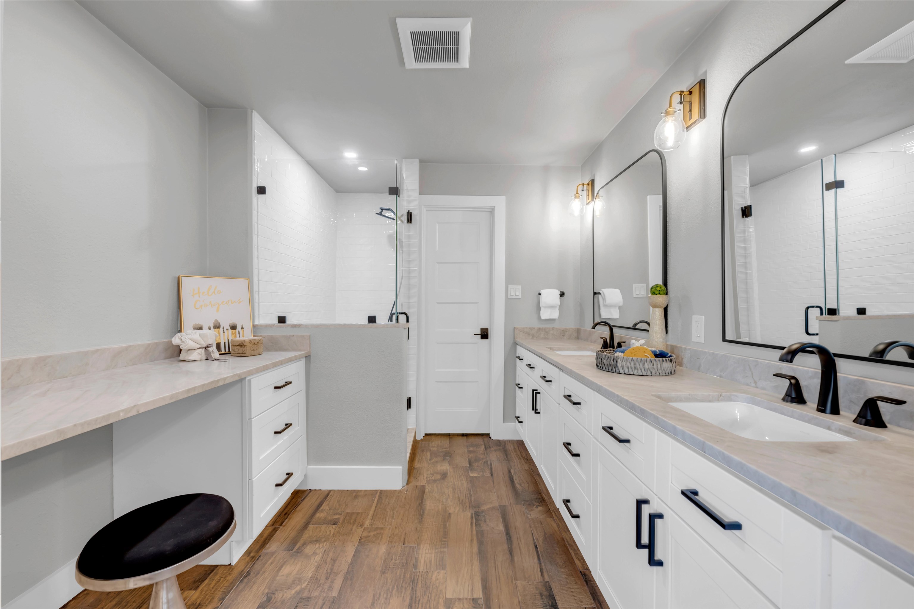 941 County Road 402 Marble Falls, TX 78654 - Photo 16 of 30 a spacious bathroom with a double vanity sink a mirror and shower