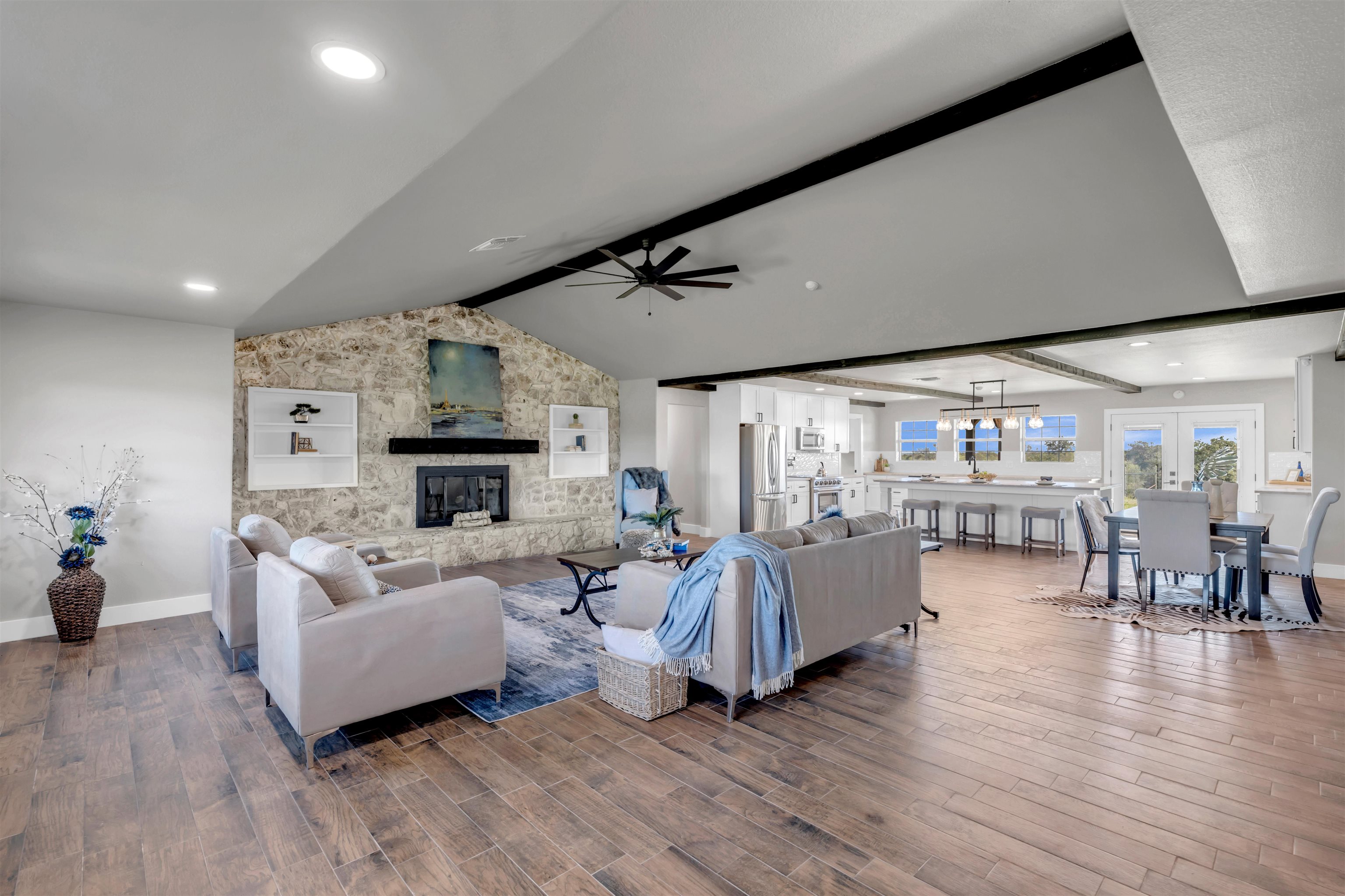 941 County Road 402 Marble Falls, TX 78654 - Photo 30 of 30 a living room with fireplace furniture and a wooden floor