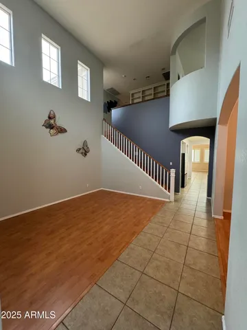 a view of an empty room with windows