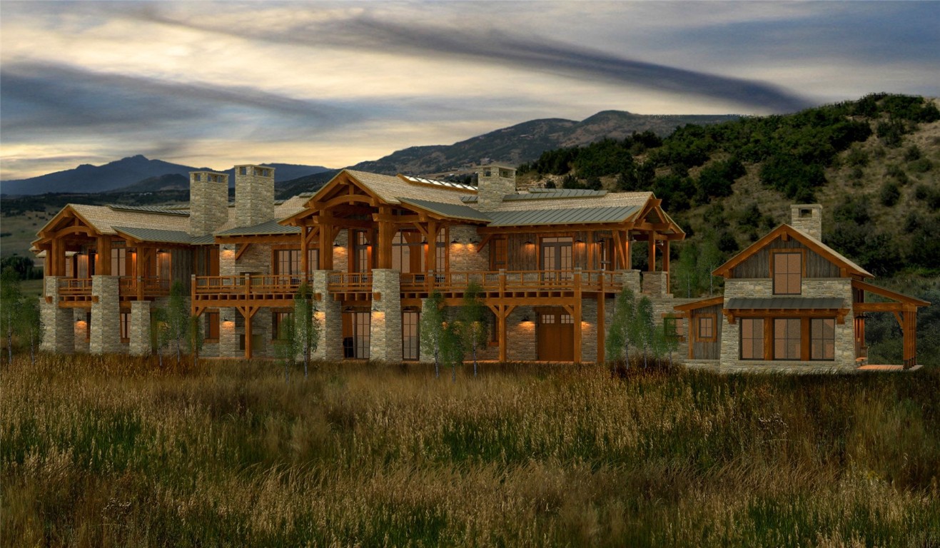 27105 Cowboy Up Road Steamboat Springs, CO 80487 - Photo 11 of 28 a view of a big house with a big yard and plants