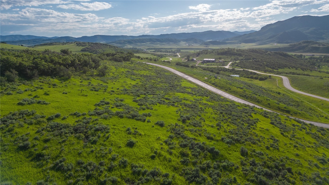 27105 Cowboy Up Road Steamboat Springs, CO 80487 - Photo 14 of 28 a view of a city with mountains in the background