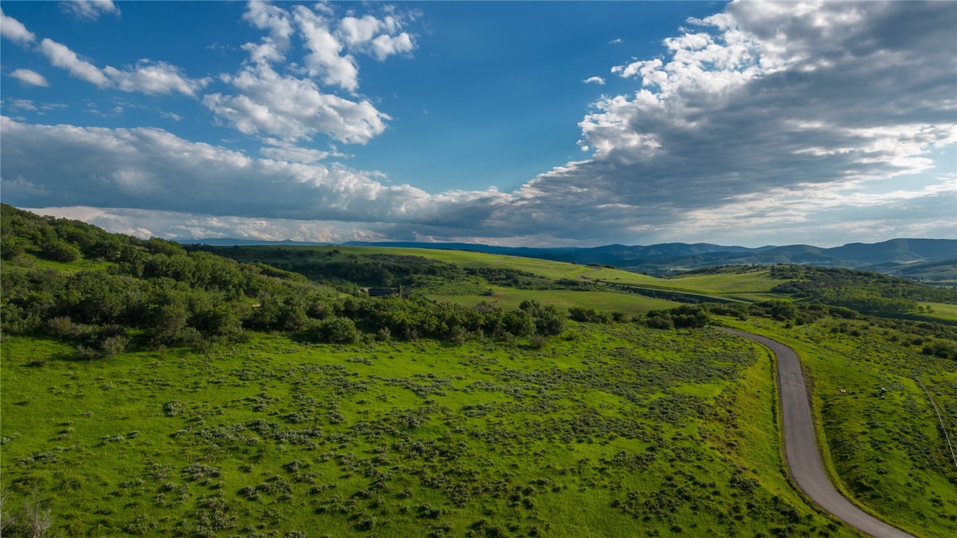 27105 Cowboy Up Road Steamboat Springs, CO 80487 - Photo 16 of 28 a view of a city with lush green forest