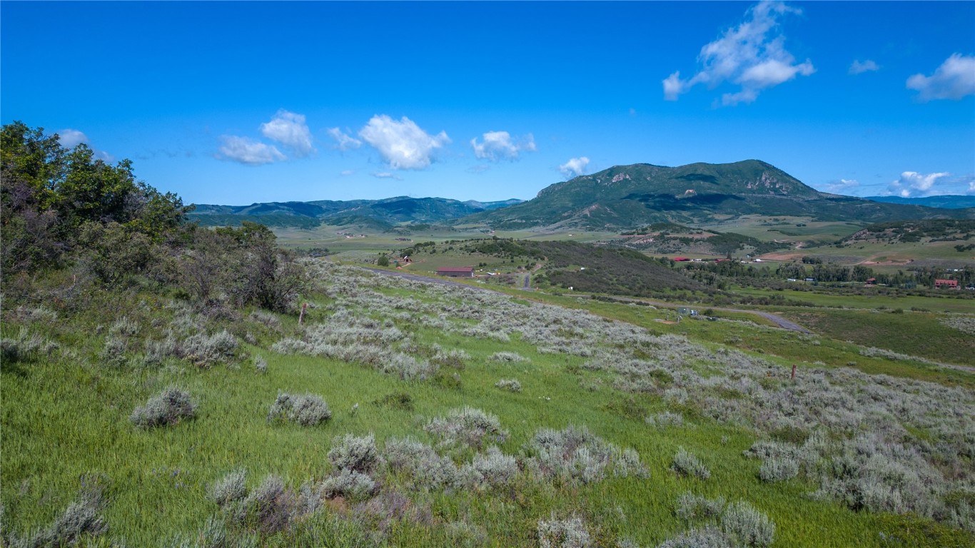 27105 Cowboy Up Road Steamboat Springs, CO 80487 - Photo 26 of 28 a view of a lake in middle of forest
