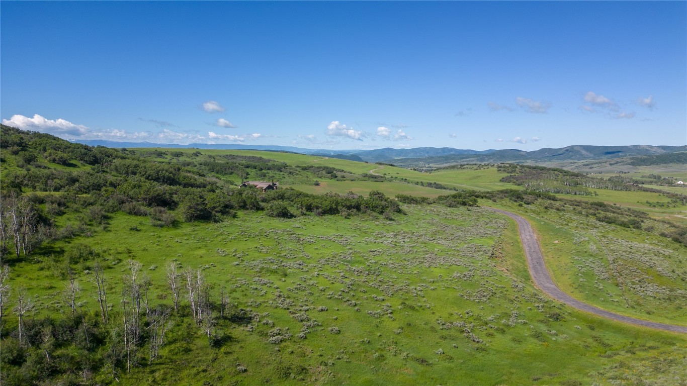 27105 Cowboy Up Road Steamboat Springs, CO 80487 - Photo 27 of 28 a view of a lake with a mountain in the background