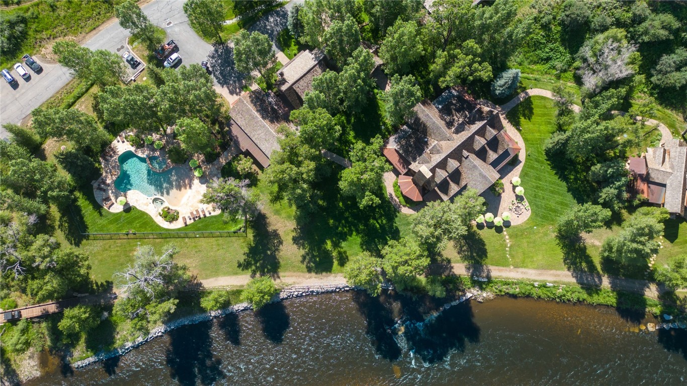 27105 Cowboy Up Road Steamboat Springs, CO 80487 - Photo 7 of 28 an aerial view of a house with a yard and garden