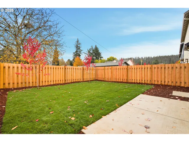 a view of a backyard with a garden