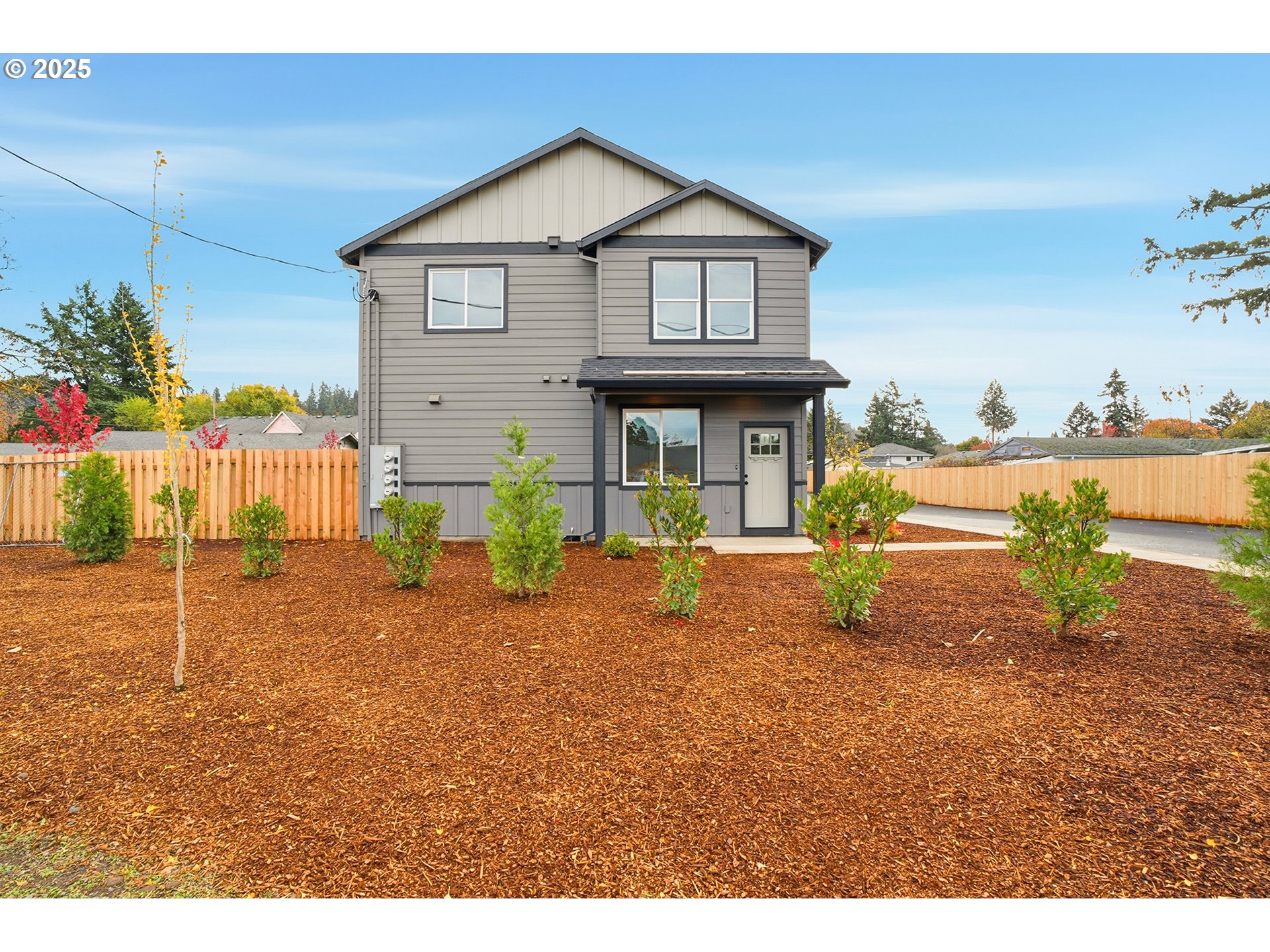 14722 Southeast Powell Boulevard Portland, OR 97236 - Photo 2 of 20 a view of a house with backyard and garden