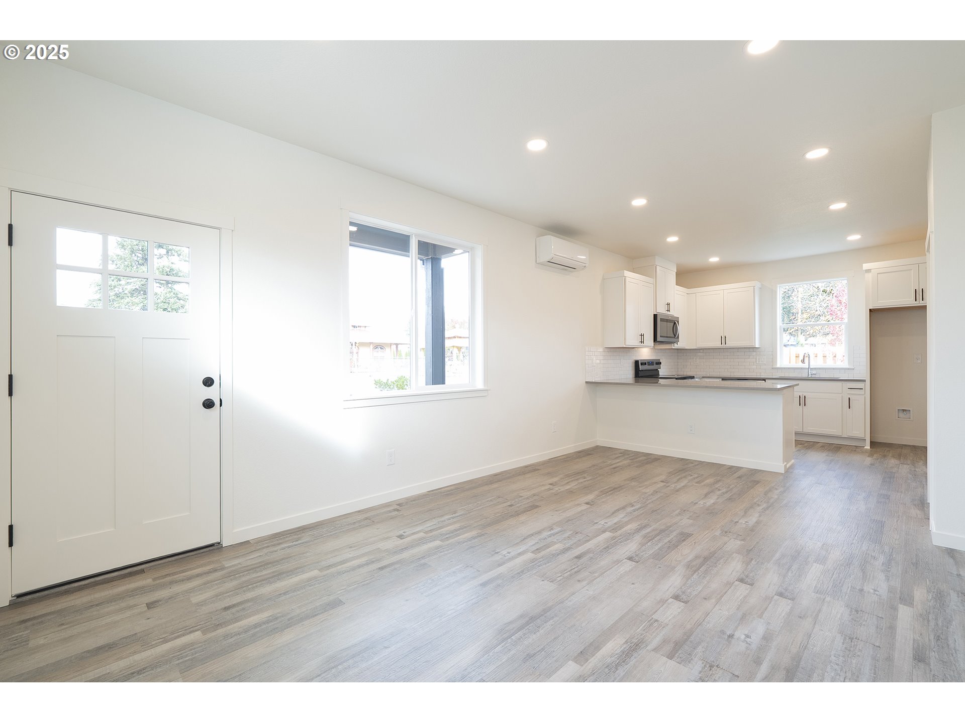 14722 Southeast Powell Boulevard Portland, OR 97236 - Photo 5 of 20 a view of kitchen with wooden floor