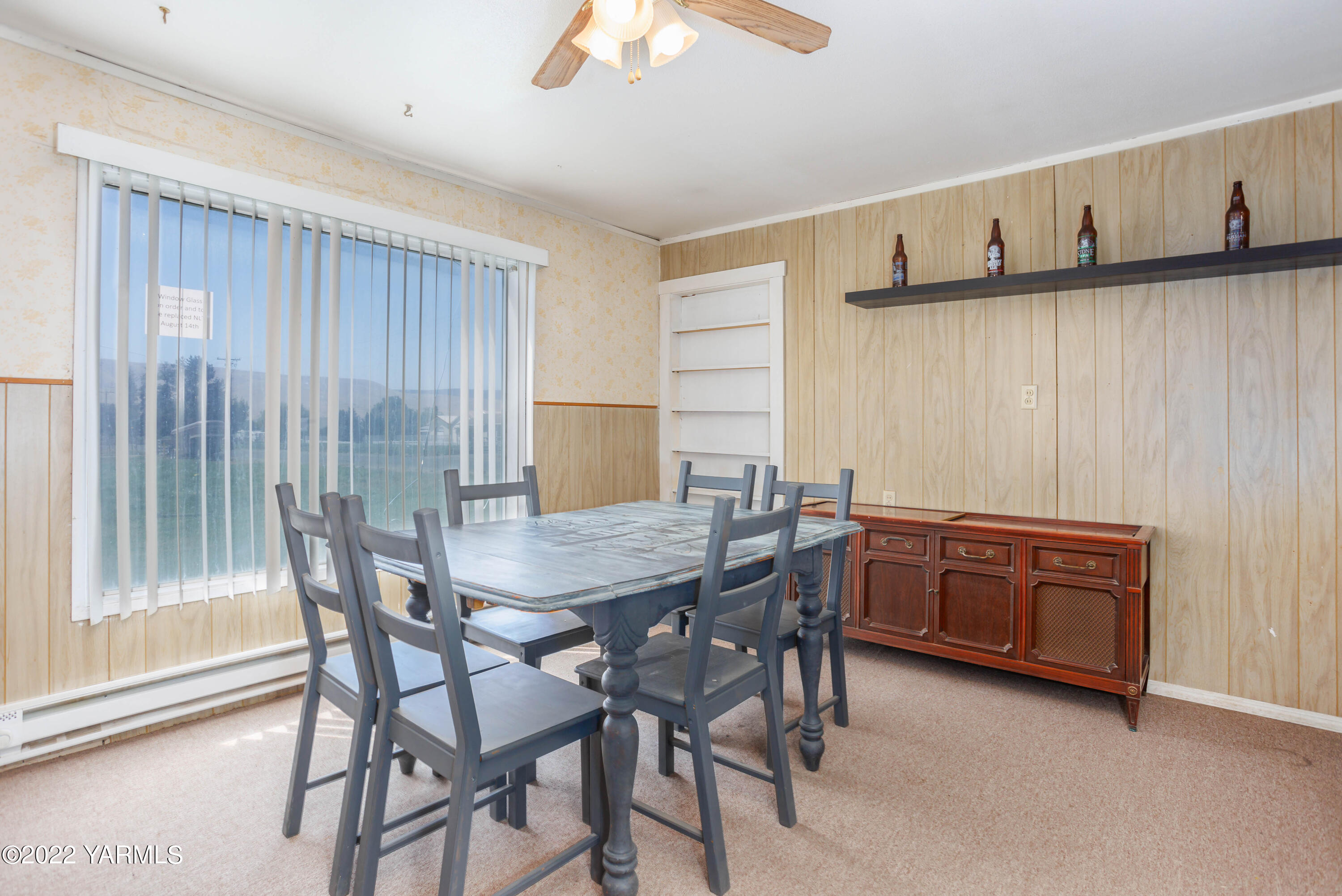 3101 South Steele Road Prosser, WA 99350 - Photo 11 of 43 a view of a dining room with furniture and chandelier