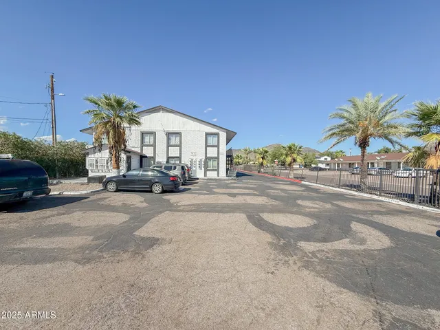 a view of a street with cars