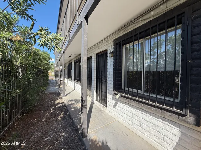a view of backyard with porch