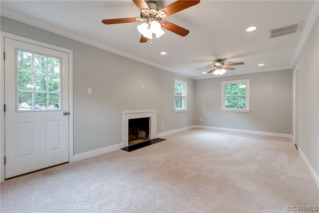 10707 River Road Chesterfield, VA 23838 - Photo 8 of 27 a view of livingroom with window fireplace