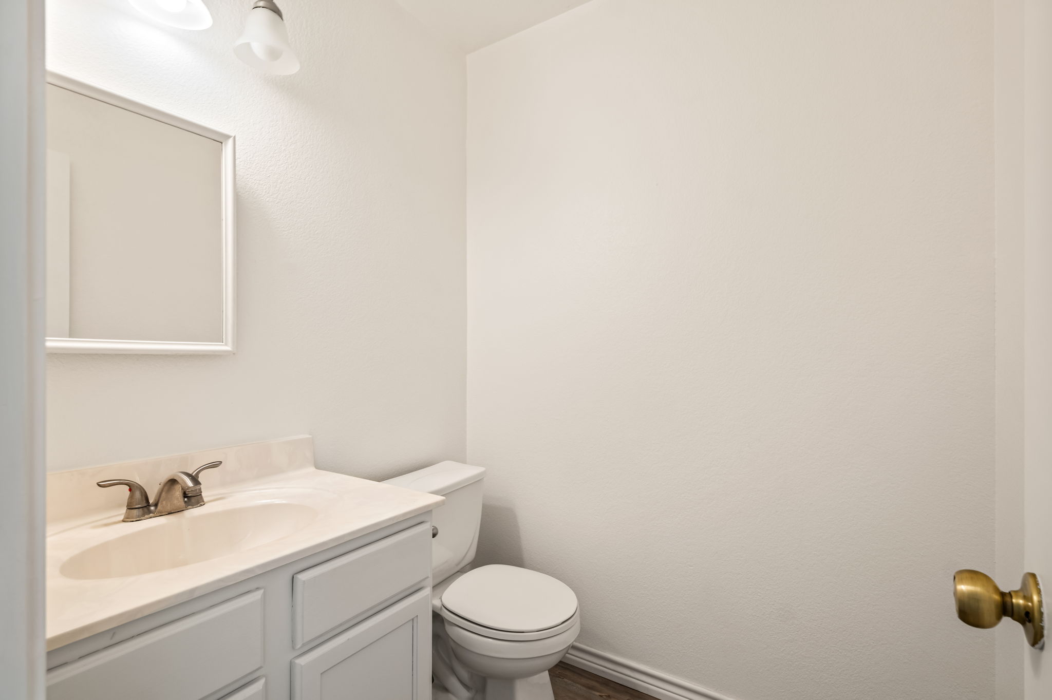 1408 Water Spaniel Way Round Rock, TX 78664 - Photo 15 of 37 Functional vanity and toilet enhance this compact, well-appointed bathroom space.