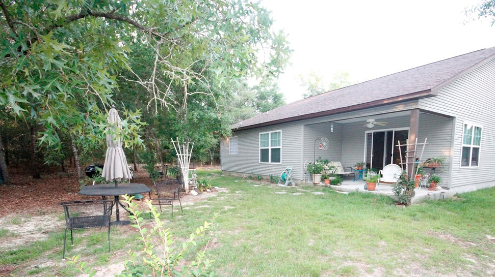 402 Hunters Ridge Road DeFuniak Springs, FL 32433 - Photo 22 of 22 Back Yard and Porch