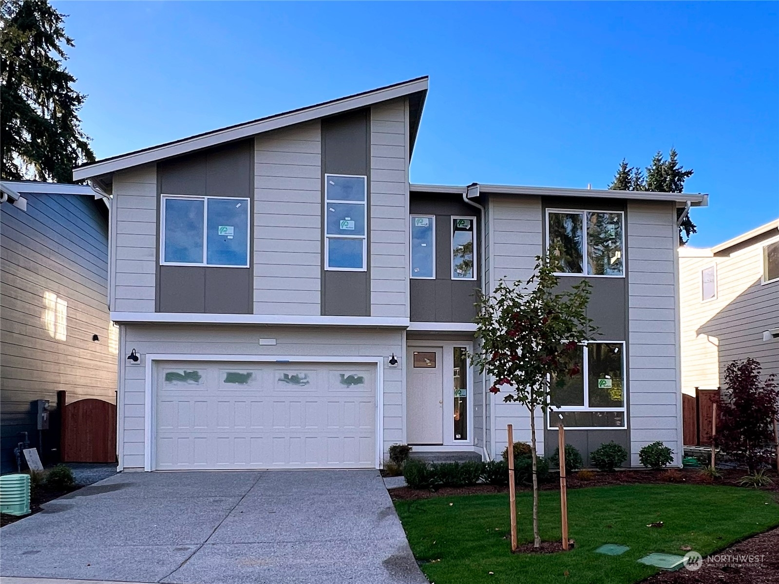 105 179th Place Southwest Bothell, WA 98012 - Photo 1 of 24 a front view of a house with a yard