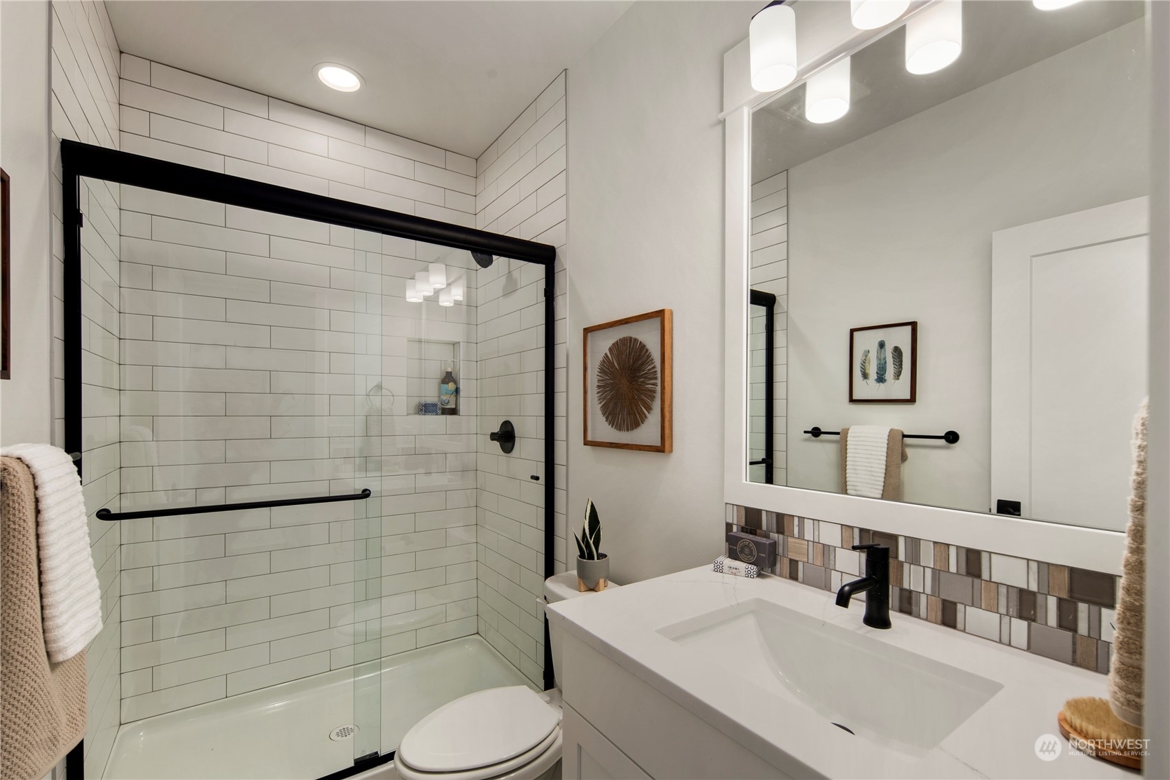 105 179th Place Southwest Bothell, WA 98012 - Photo 13 of 24 a bathroom with a sink a toilet and shower