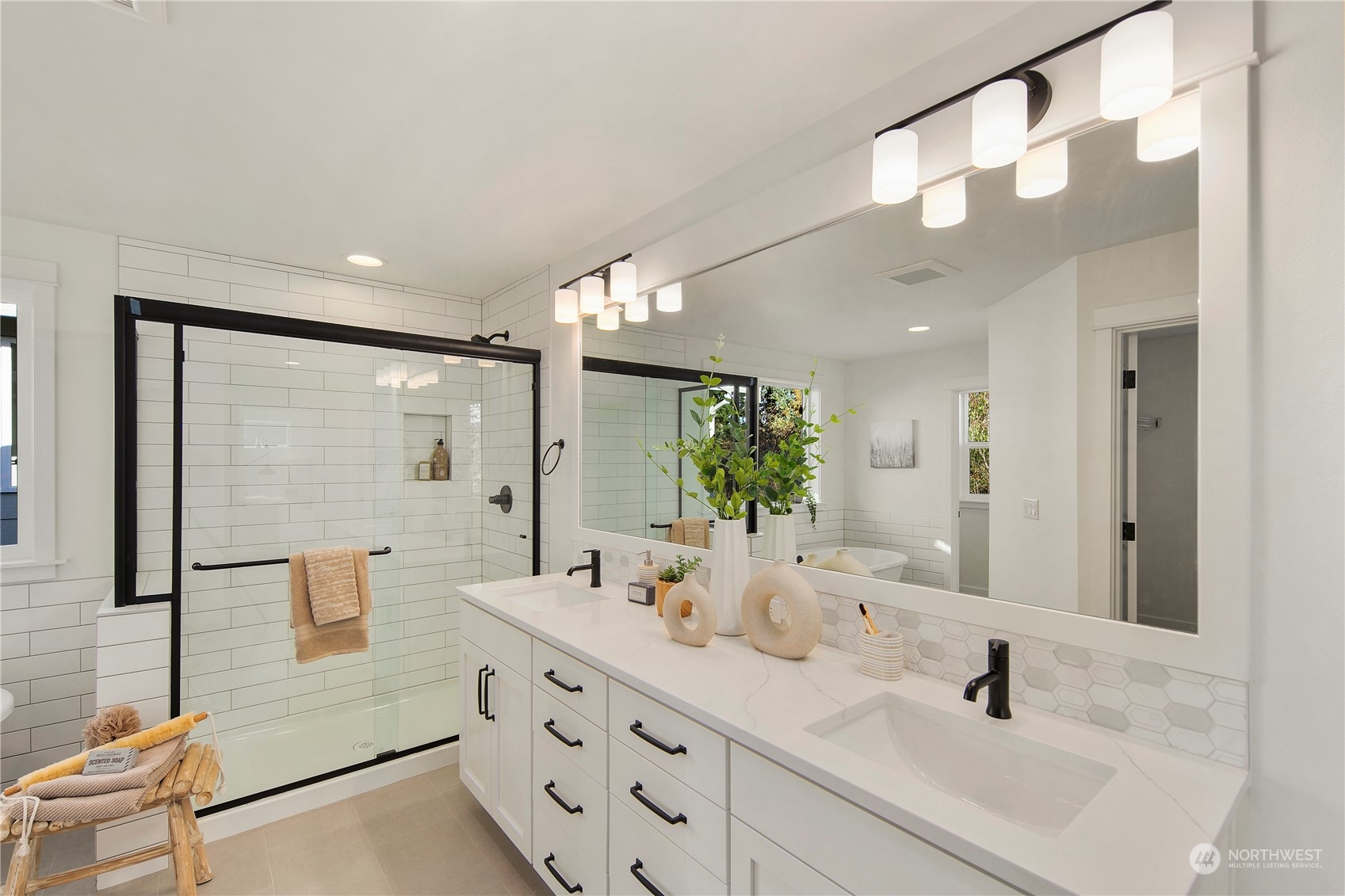 105 179th Place Southwest Bothell, WA 98012 - Photo 18 of 24 a bathroom with double vanity sink and mirror