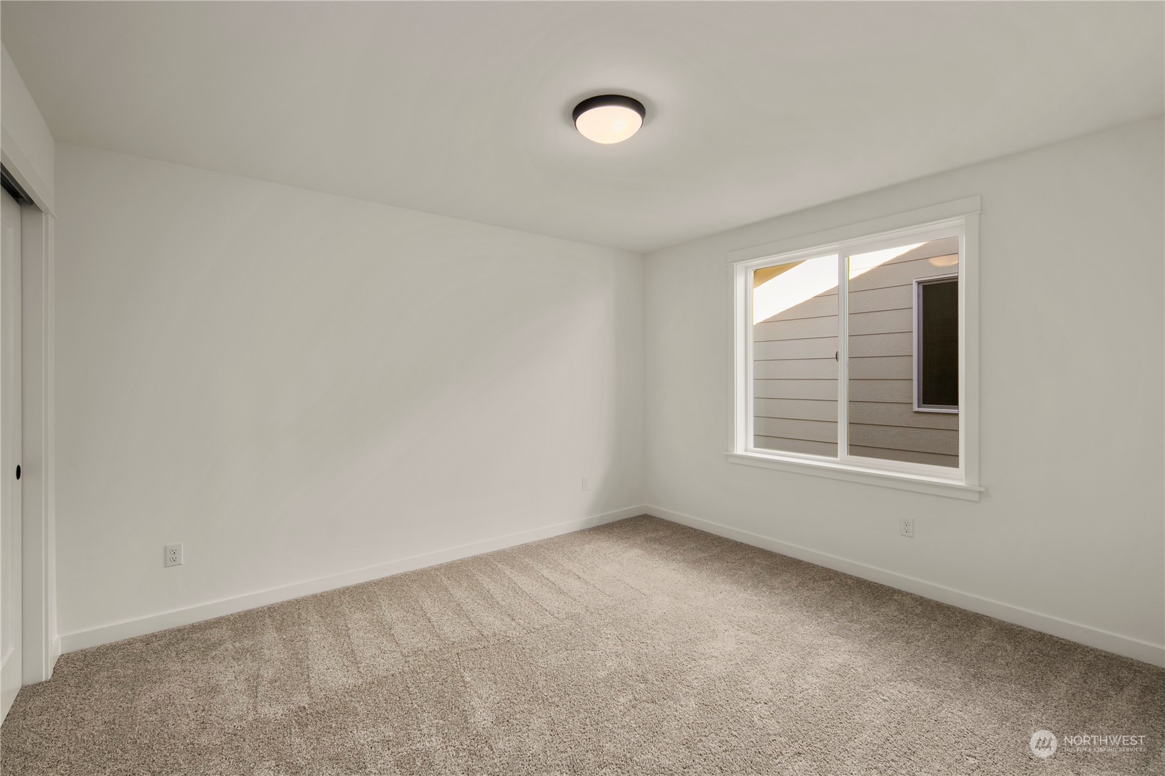 105 179th Place Southwest Bothell, WA 98012 - Photo 23 of 24 a view of an empty room with a window